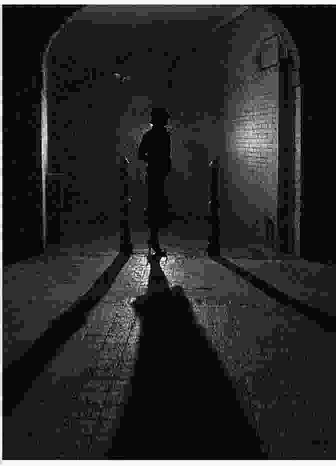 A Shadowy Figure Carrying A Body Bag Through A Dark Alley Anthology Of Classic Short Stories Vol 5 (Horror And Ghosts): The Body Snatcher By Robert Louis Stevenson The Signal Man By Charles Dickens The Monkey S Paw By W W Jacobs And Others