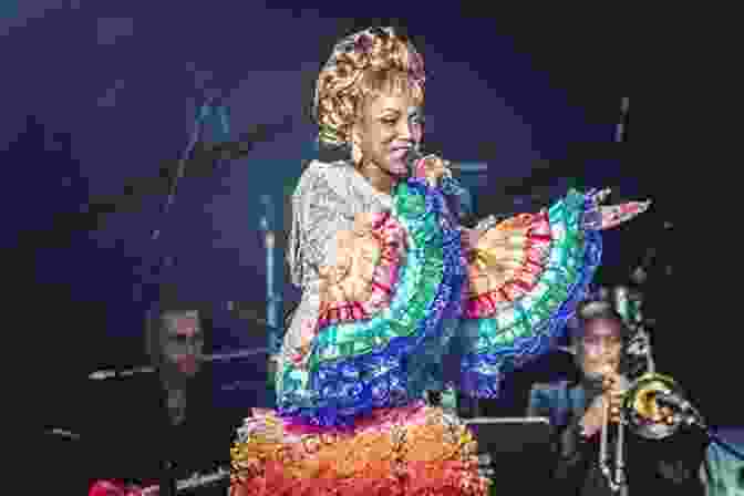 Celia Cruz Performing On Stage, Wearing A Sequined Dress And A Large Feathered Headdress Celia Cruz (The Great Hispanic Heritage)