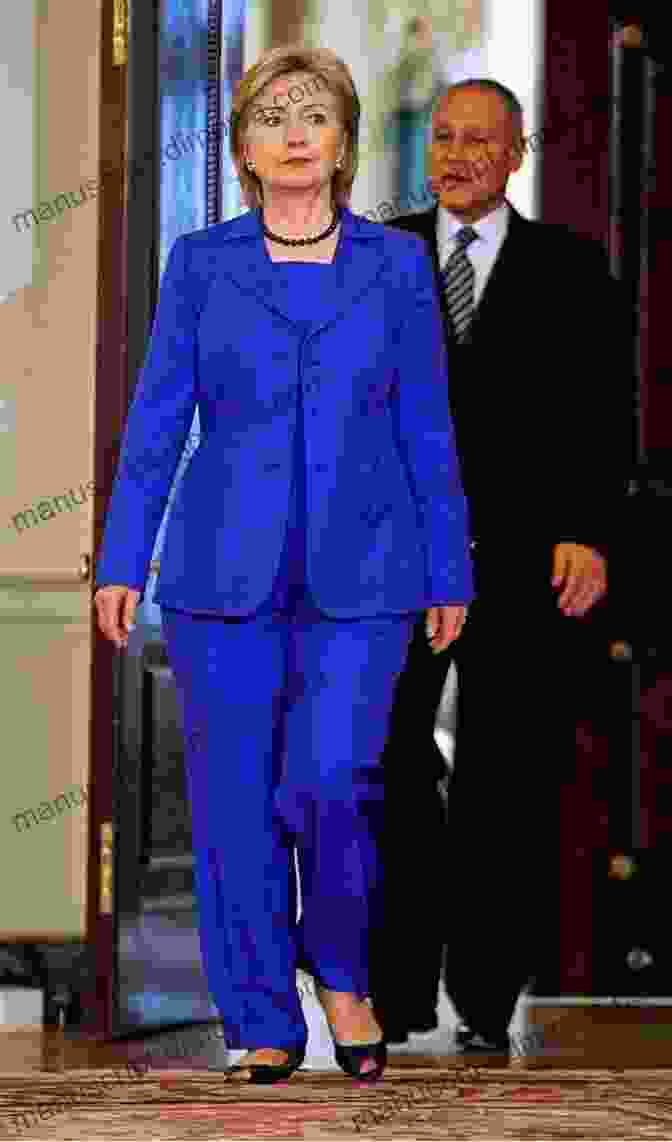 Hillary Clinton, A Smiling Woman With Short Blonde Hair, Wearing A Blue Pantsuit. Political Power: Democrats: A Graphic Novel: Hillary Clinton Al Franken Ted Kennedy Barack Obama