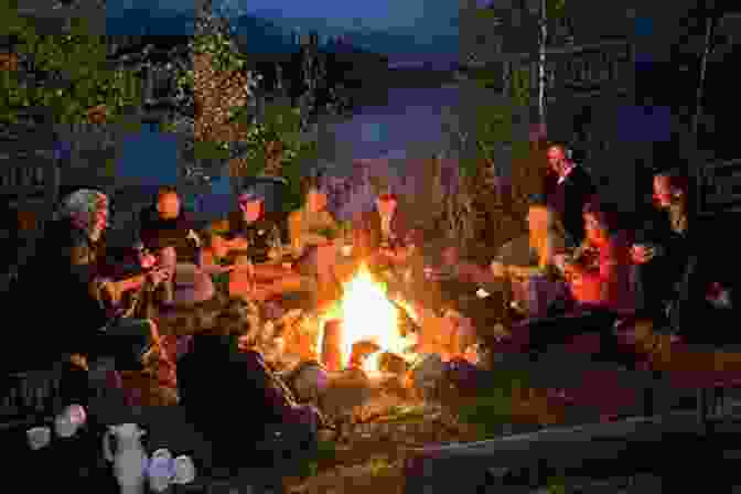 Image Of People Sitting Around A Campfire At Sunset It Never Rains But It Paws: A Road Trip Through Politics And A Pandemic (Adventure Caravanning With Dogs 4)