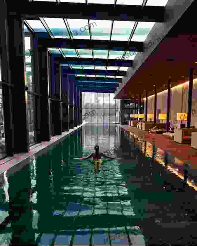 Infinity Pool At The Chedi Andermatt, Framed By Snow Capped Mountains. Infinity Pools Around The World: 2024