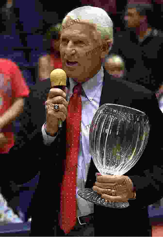 Lute Olson And Chris Parker Embracing On The Court Lute Olson Chris Parker