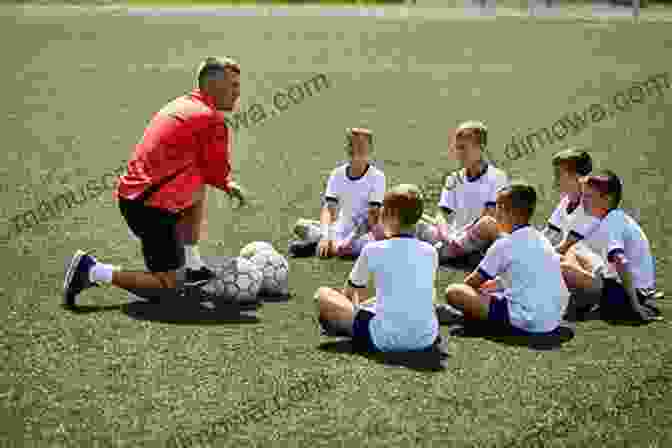 Soccer Coach Instructing Players During A Training Session The Ultimate Soccer Coaching Tactics Bundle: 5 Soccer Coaching In 1 To Improve Your Soccer Skills